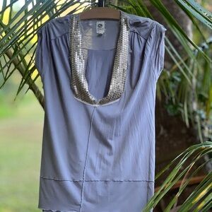 Light blue top from Anthropologie by Tiny.  This a classic sought after item.